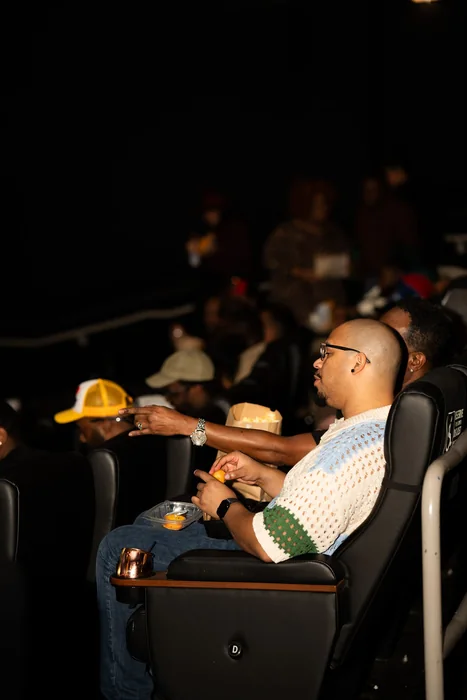Guests seated inside Landmark’s Bethesda Row Cinema