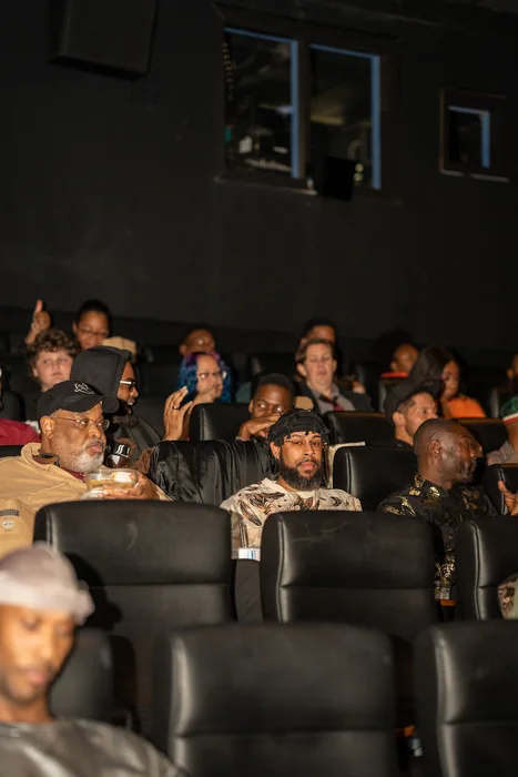 Guests seated inside Landmark’s Bethesda Row Cinema